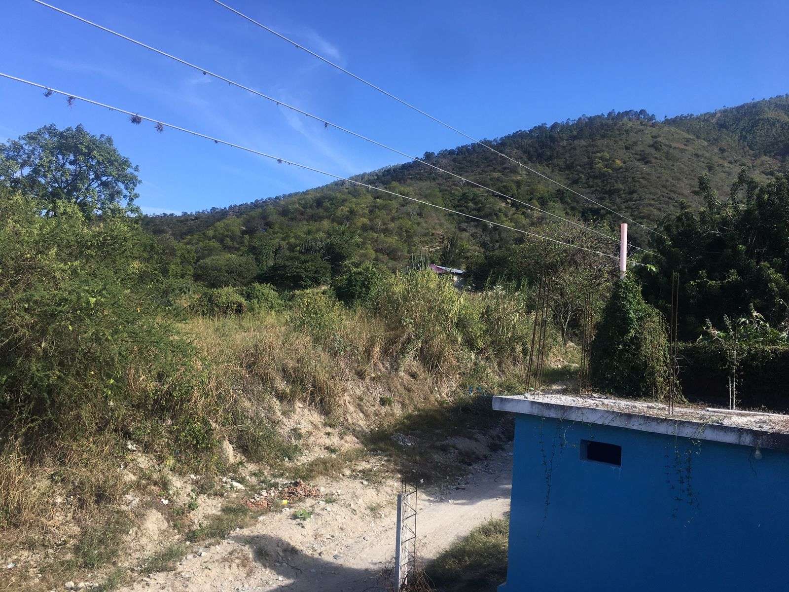 Mountainous area located on one side