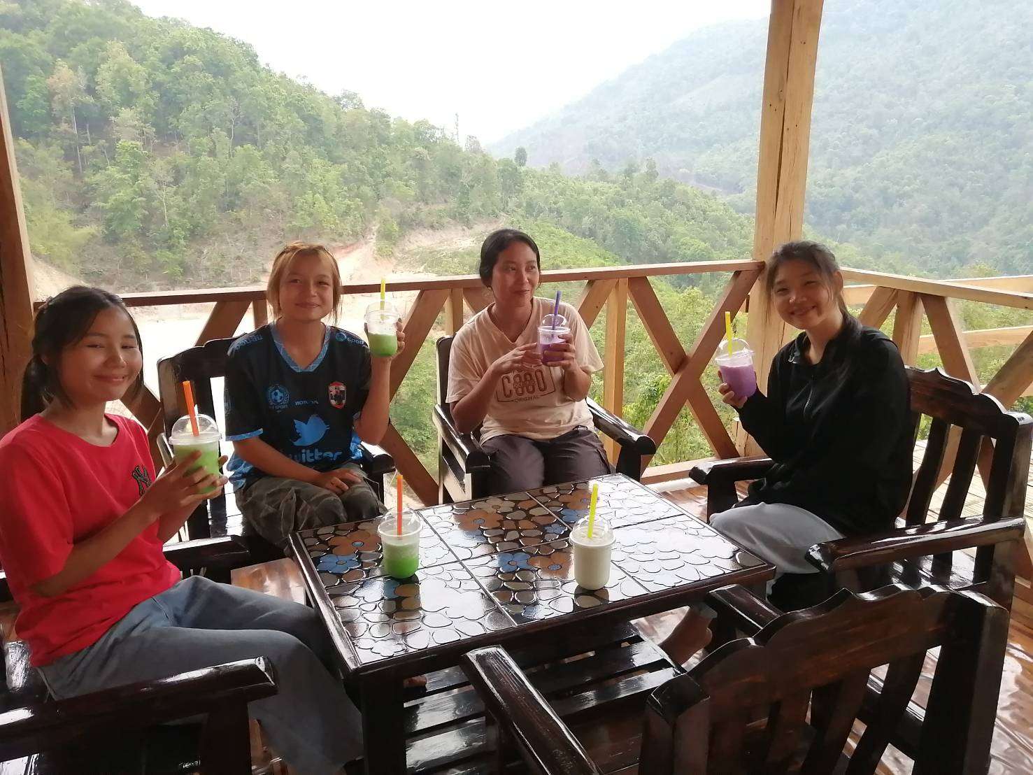 Customers arrive to order healthy drinks, supporting youth in their skill-building journey.