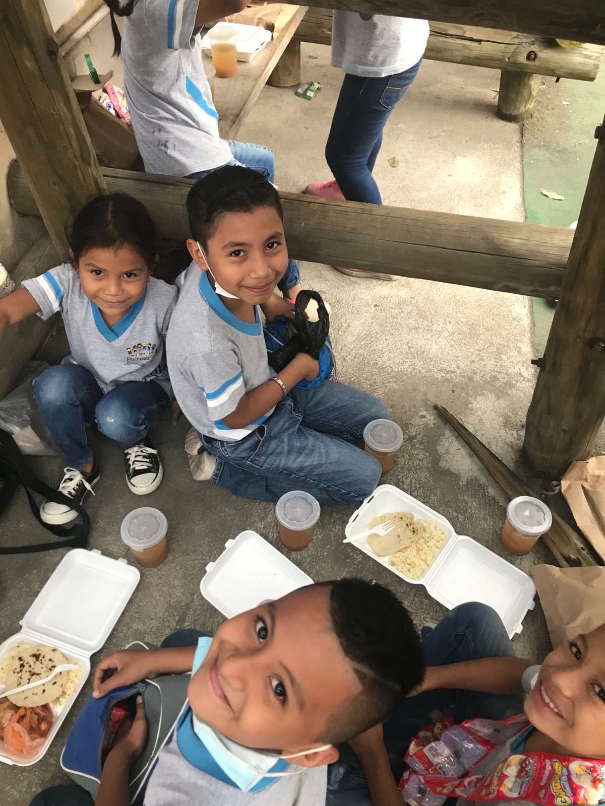 Eating in the shade of the children's game