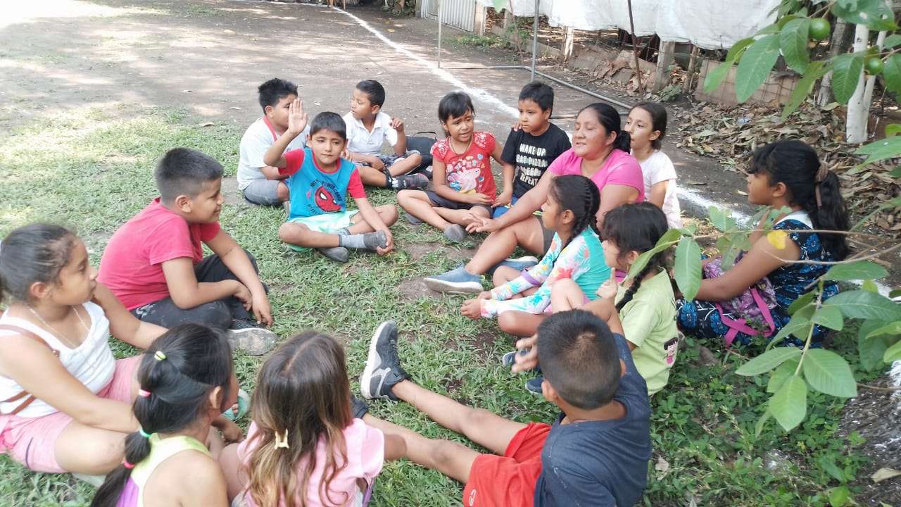 another group of participants in the courtyard due to heat