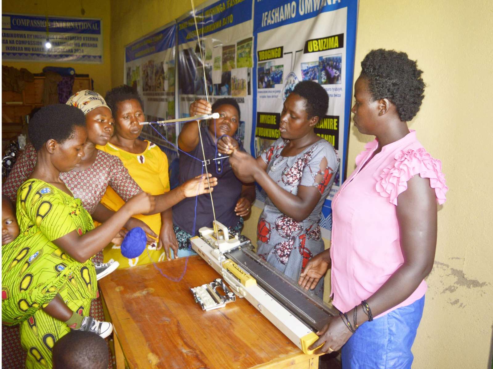 This photo shows the weavers who were weaving