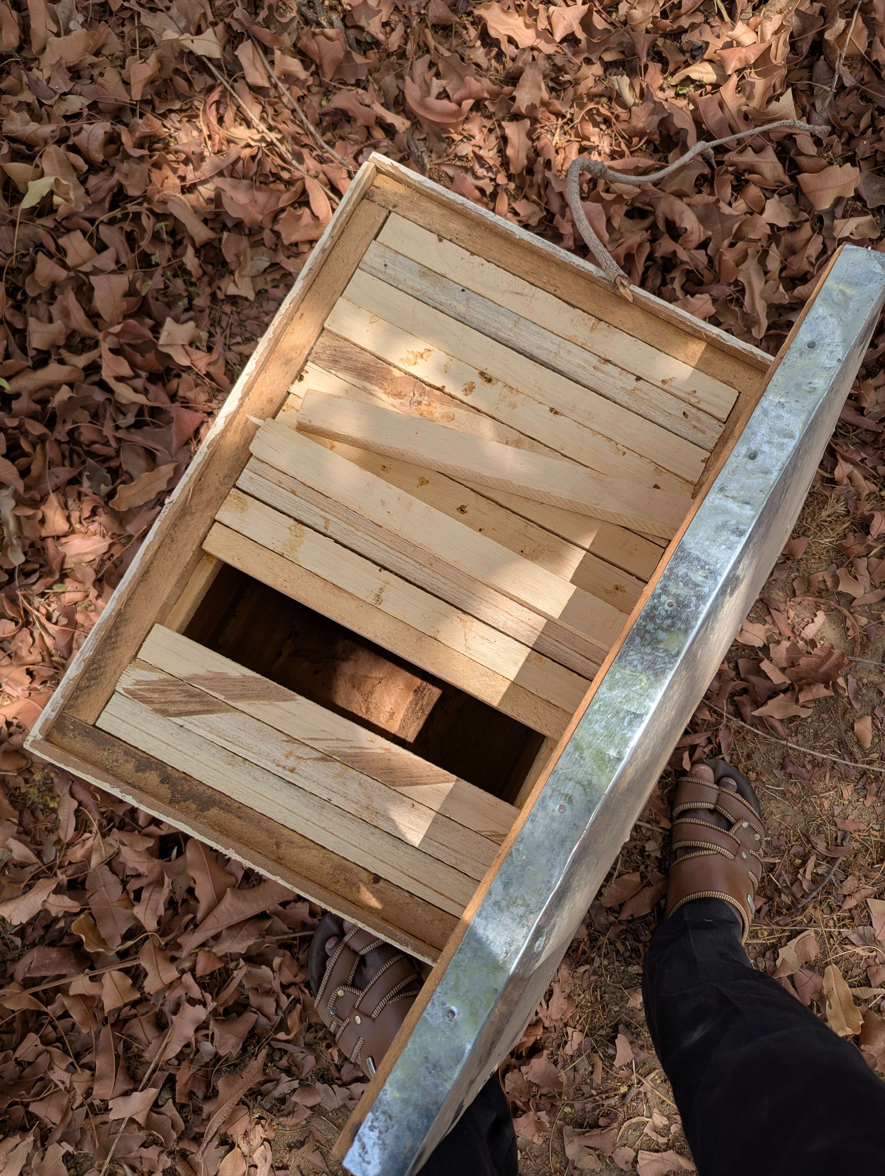 Hive being prepared before being placed on the tree