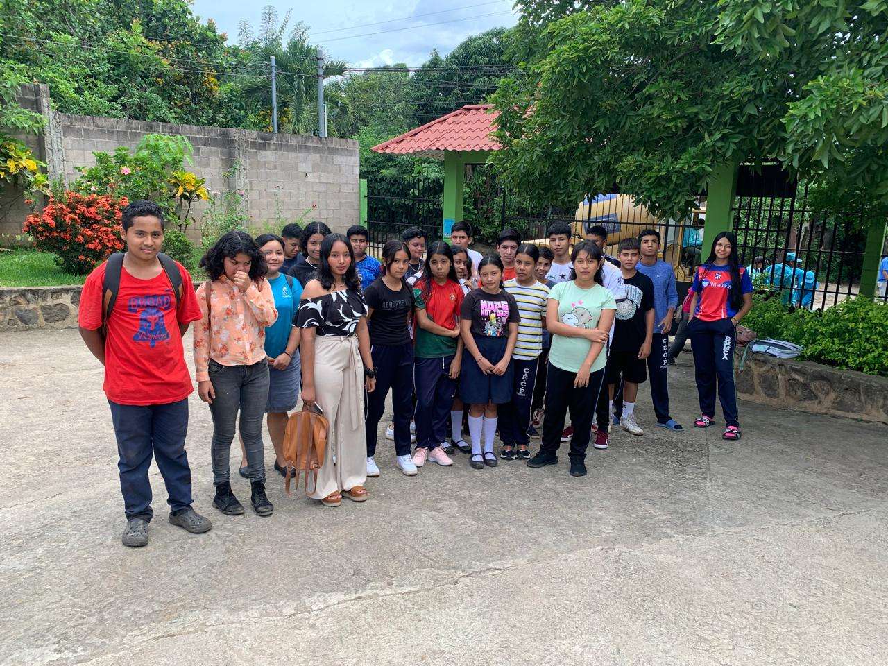 Children and young people doing activities in the parking lot.