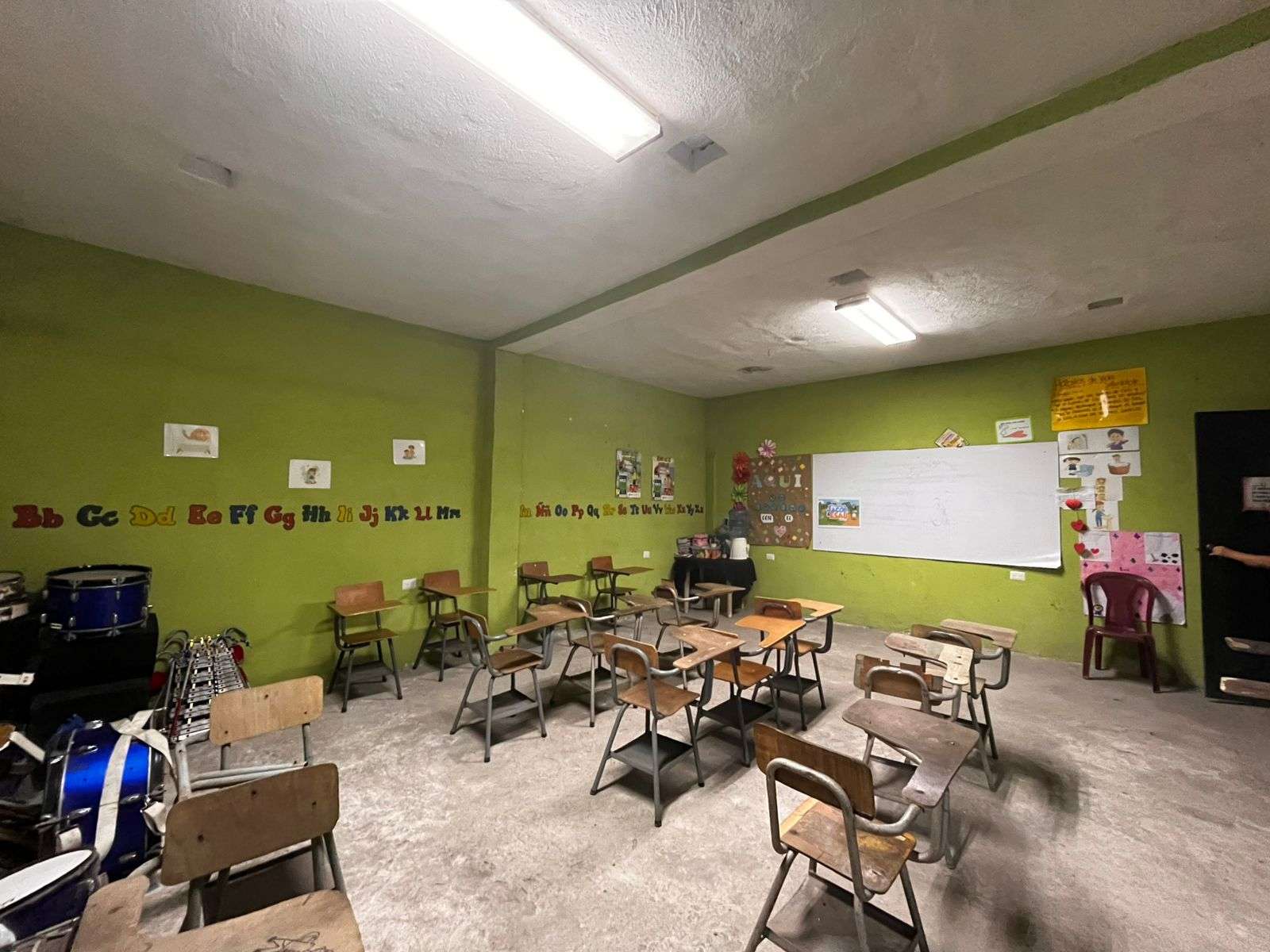 classroom with lights on, they cause more heat