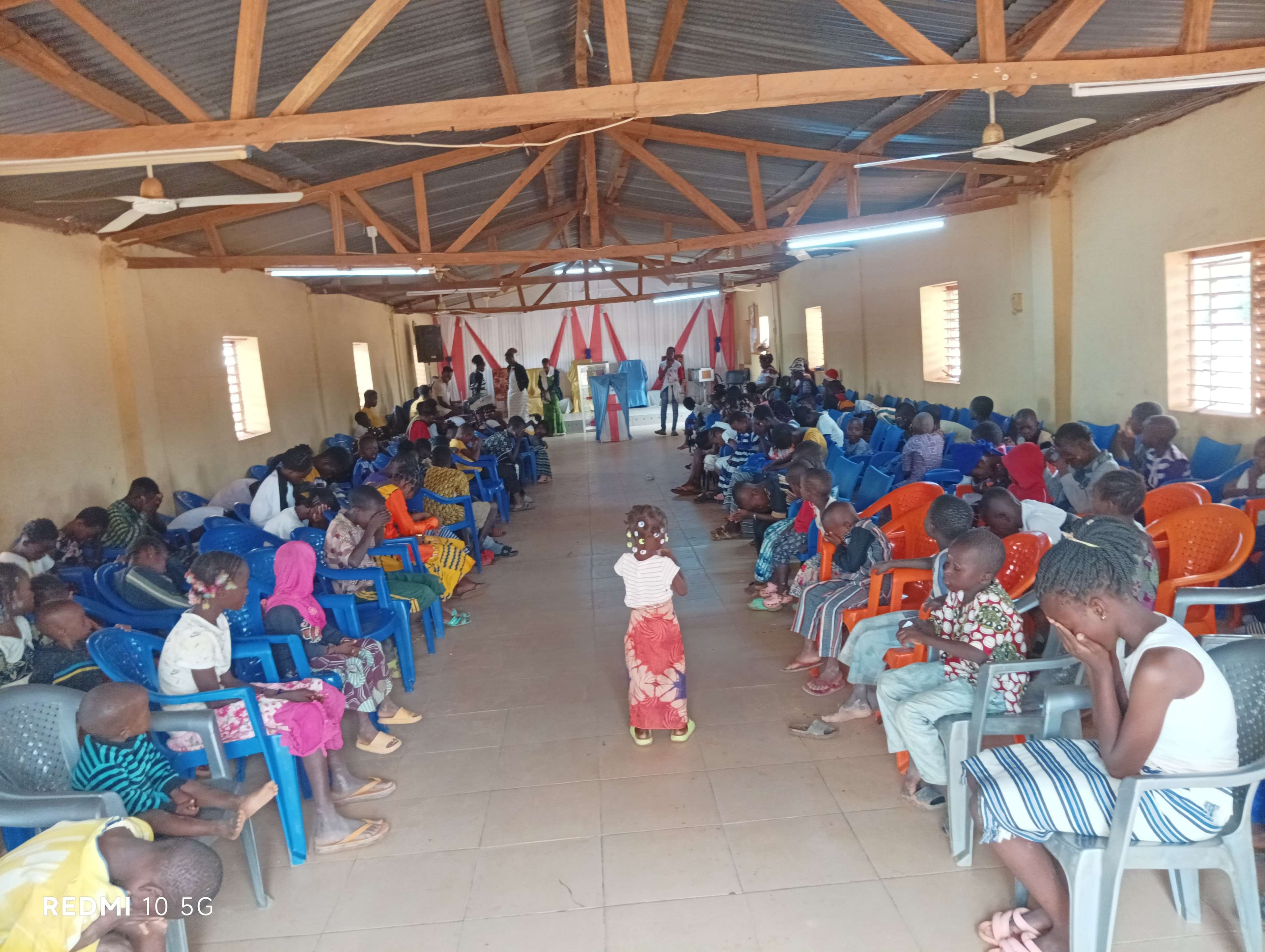 Prayer with the pastor within the church.