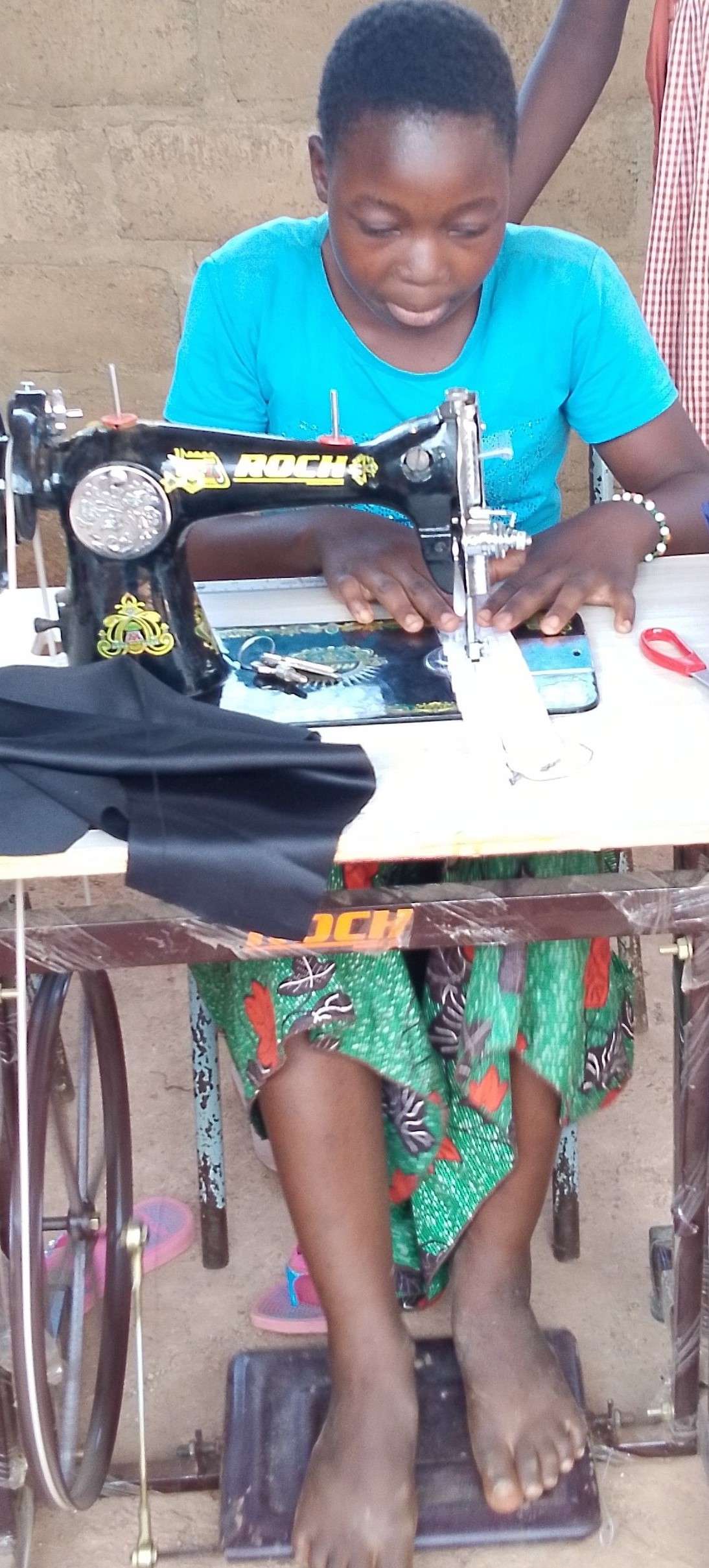 A participant's training in sewing and cutting
