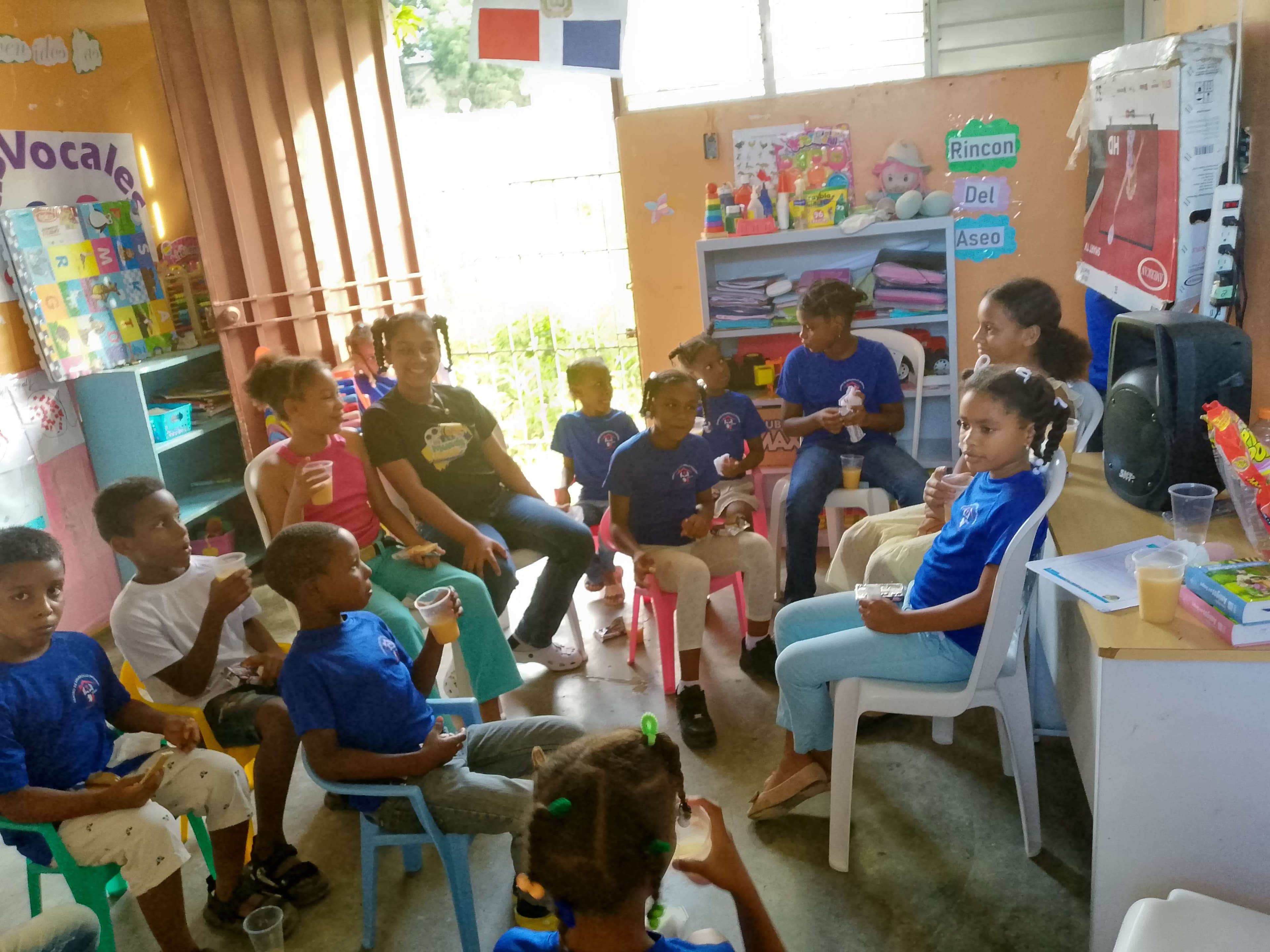 Children and teenagers on another day having a snack