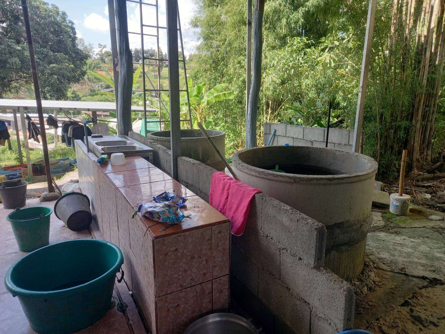 Current Challenges: The shower area is located near the dishwashing space, using a cement pipe as a temporary solution. Let's work together to create a more sanitary and functional environment for our young athletes!